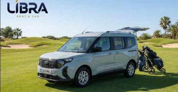 Light grey Ford Tourneo Courier car hire for golfers on a golf course in Fuengirola, Costa del Sol, with open boot showing golf bags and Libra Rent a Car logo.